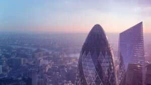 Arial phtoo of the Gherkin with London skyline at dawn